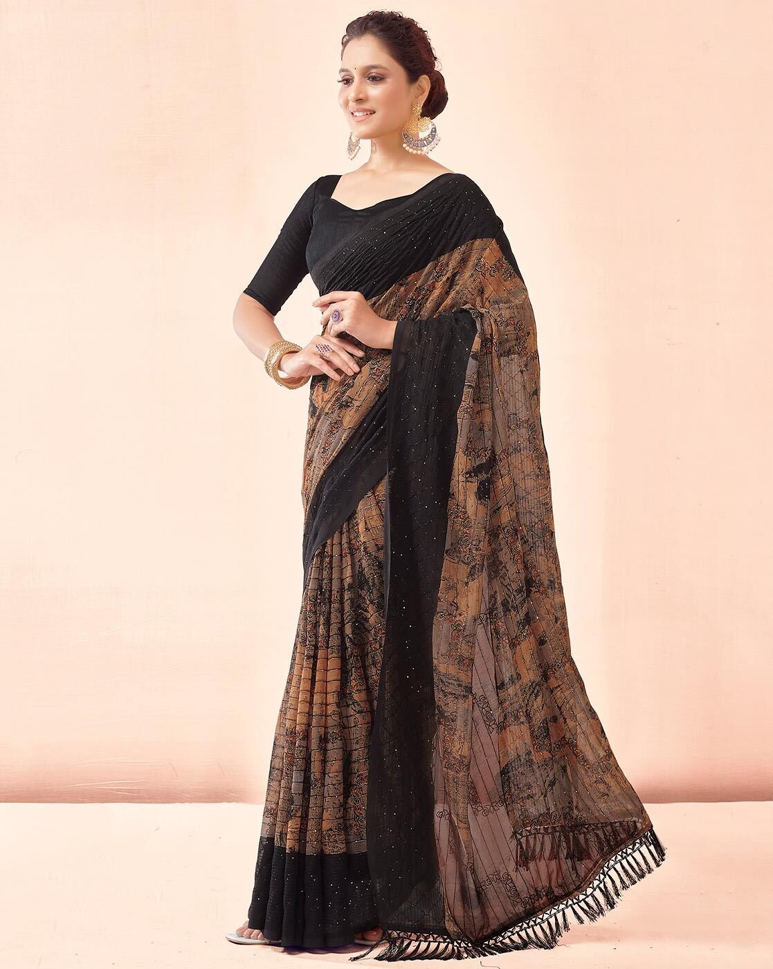 1117Wx1400H-467059765-black-MODEL2.jpg Women Embellished Georgette Saree - Image 1
